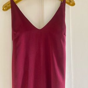 Burgundy Long satin stappy dress with front slit.